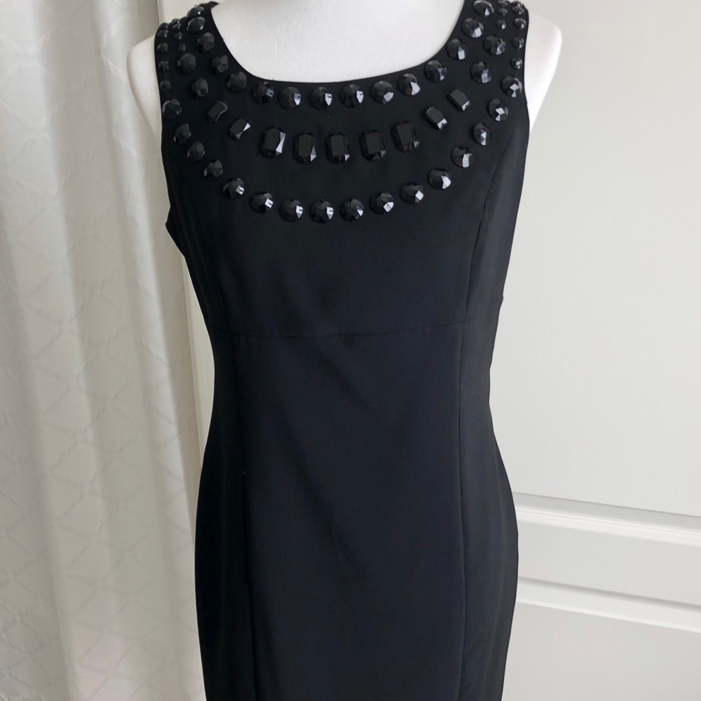 Glensport elegant black dress.Tags off Never worn.